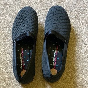 Skechers Memory Foam slip ons. Nice satin strip on top. NWOT